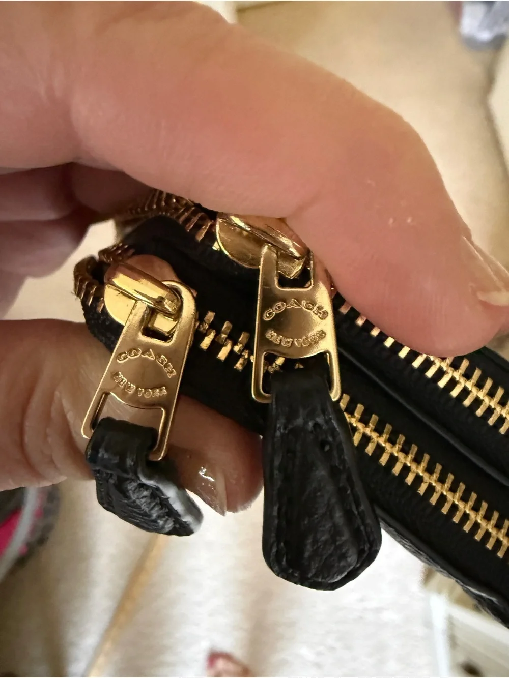 Coach Black Pebbled Leather Pouch with Gold Emblem